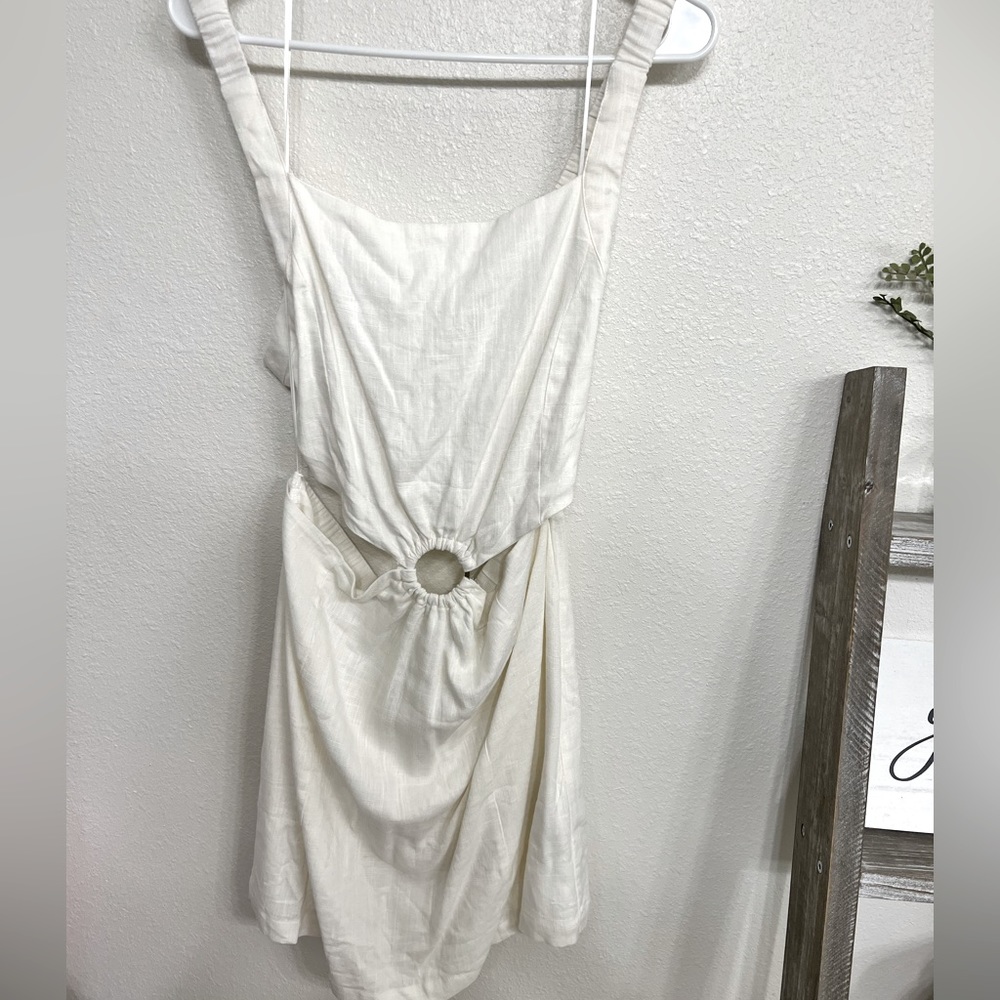 White linen mini dress with open back